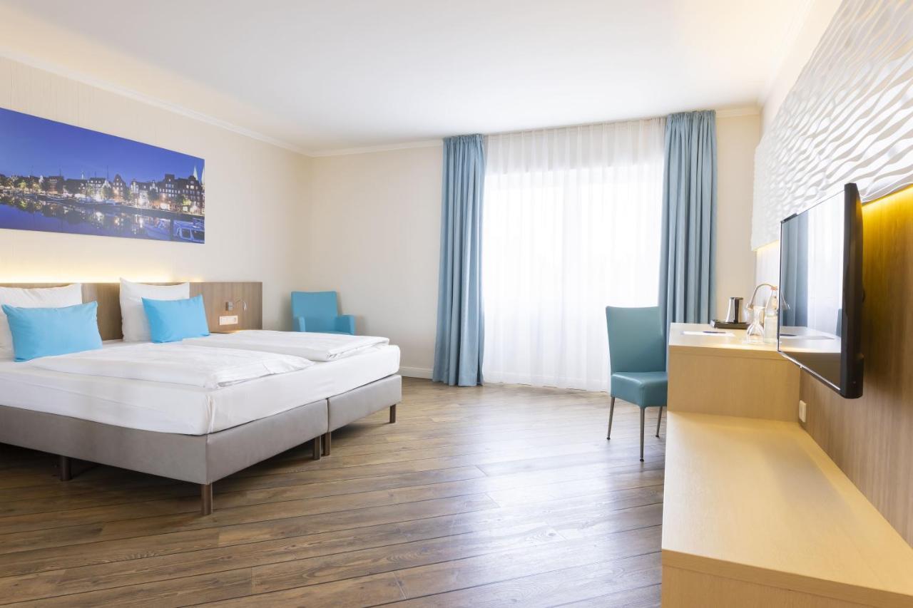 Hotel IV Jahreszeiten Luebeck Esterno foto