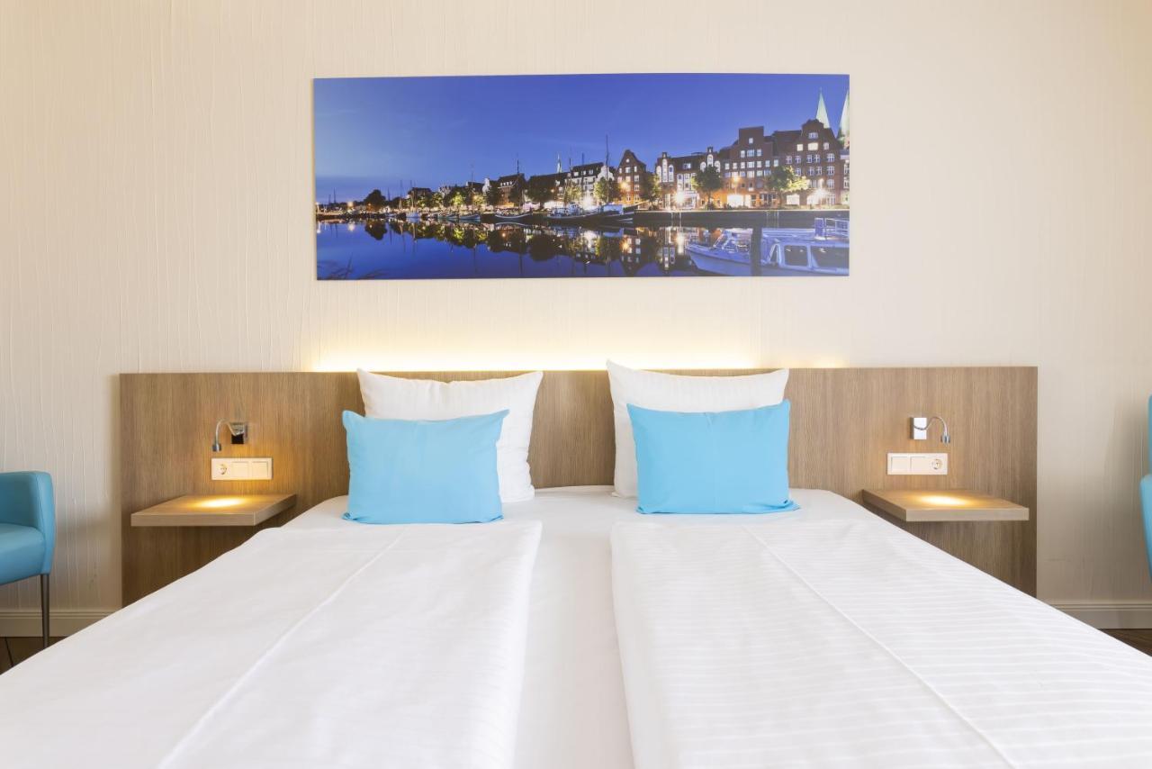 Hotel IV Jahreszeiten Luebeck Esterno foto