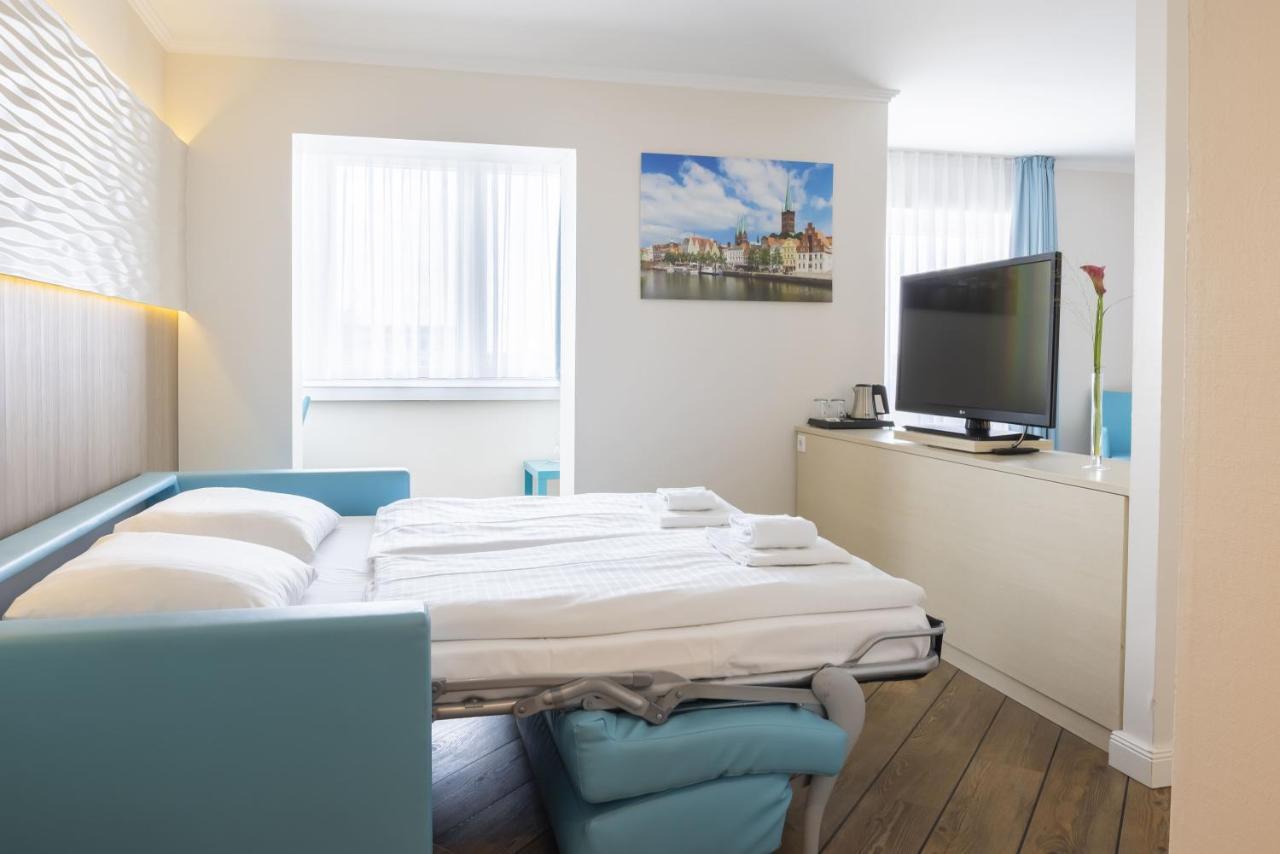 Hotel IV Jahreszeiten Luebeck Esterno foto