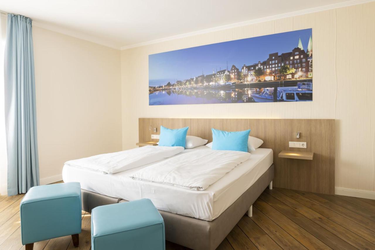 Hotel IV Jahreszeiten Luebeck Esterno foto