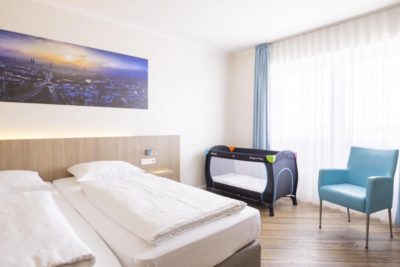 Hotel IV Jahreszeiten Luebeck Esterno foto